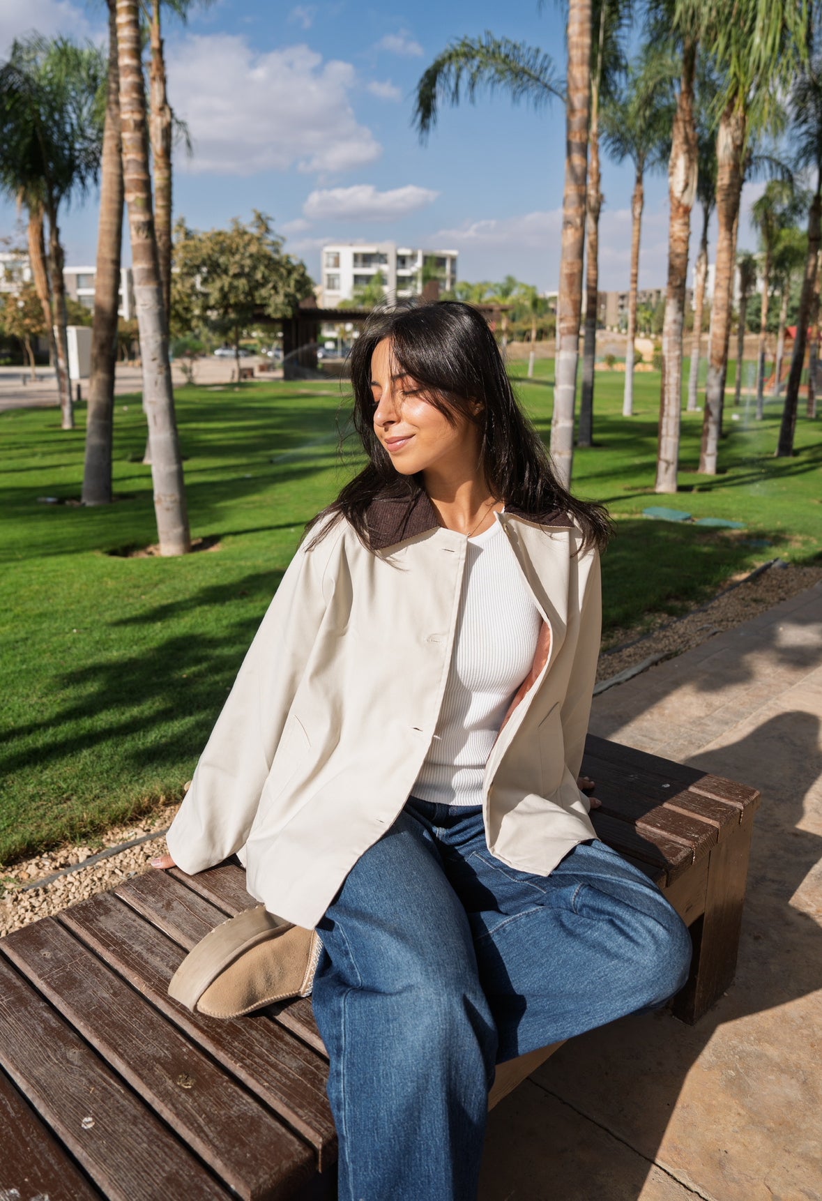 The beige trench coat