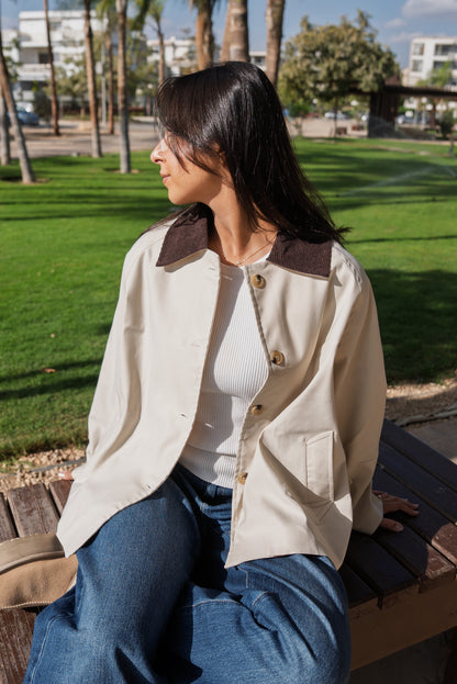 The beige trench coat