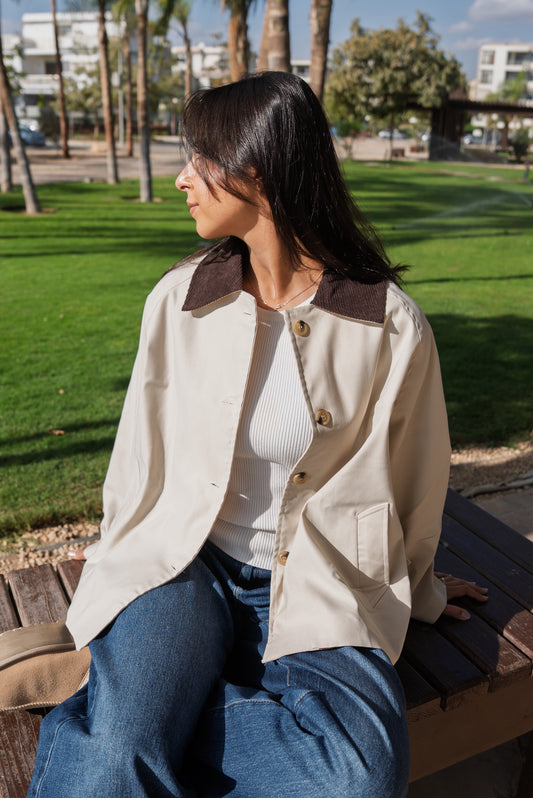 The beige trench coat