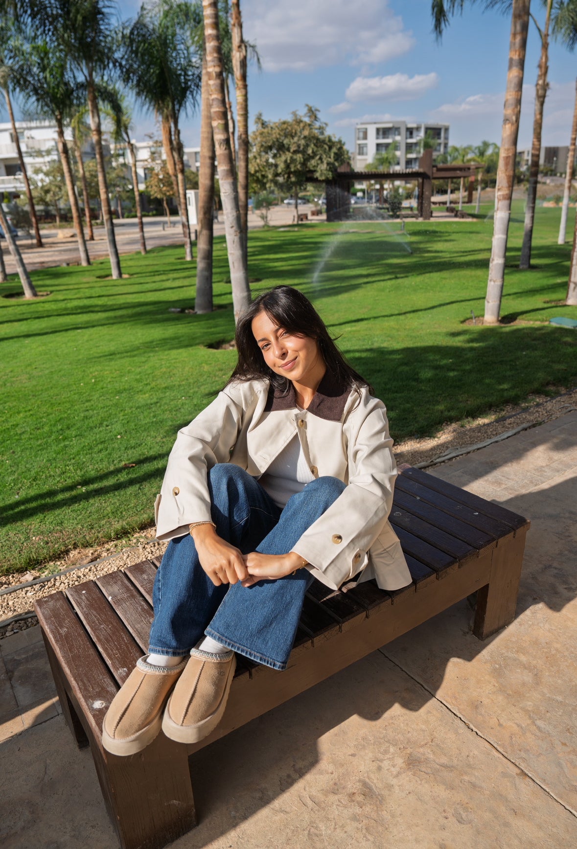 The beige trench coat