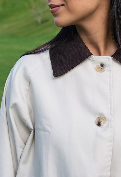 The beige trench coat