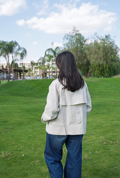 The beige trench coat